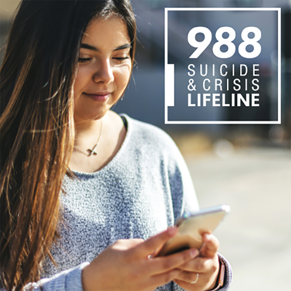 988 Crisis & Suicide Lifeline. Girl texting.