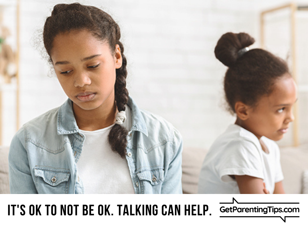 Two kids with their backs to each other, looking frustrated. Text: It's OK to not be ok. Talking can help. GetParentingTips.com