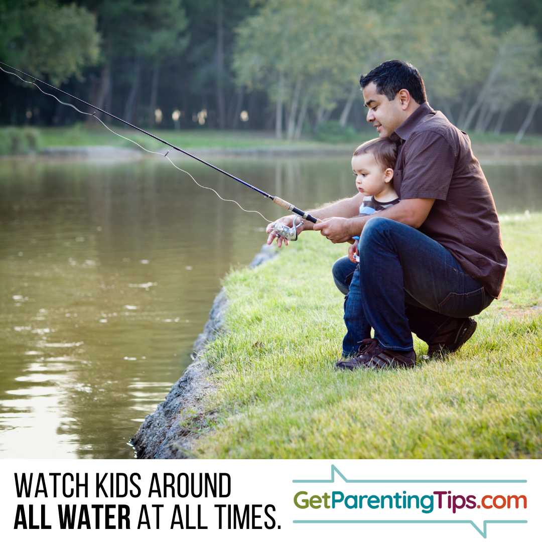 Father and young son fishing on a lake. Watch Kids around water at all times! GetParentingTips.com