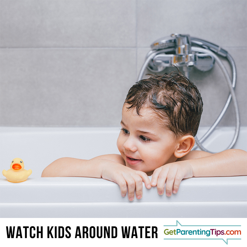 Kid in bathtub. Text: Watch Kids around water. GetParentingTips.com